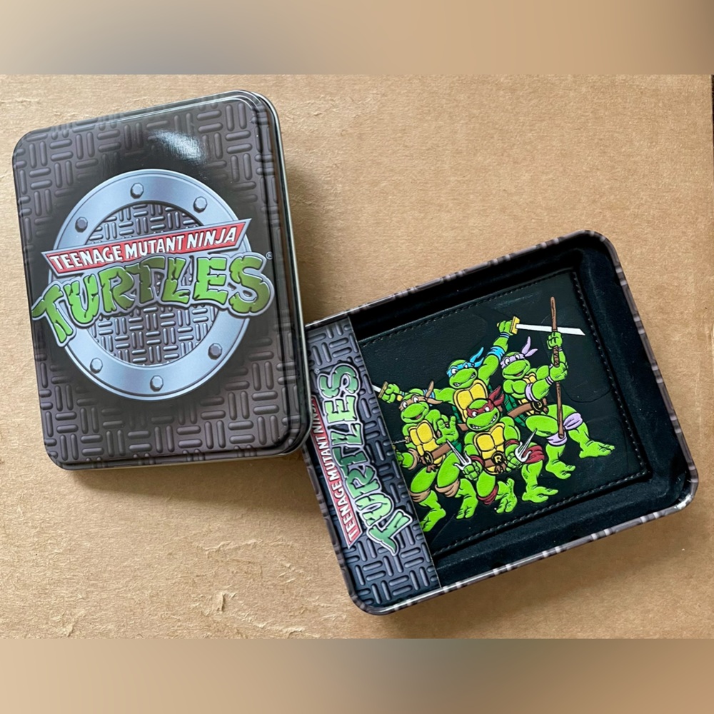 Vintage TMNT wallet in tin box. Brand New.